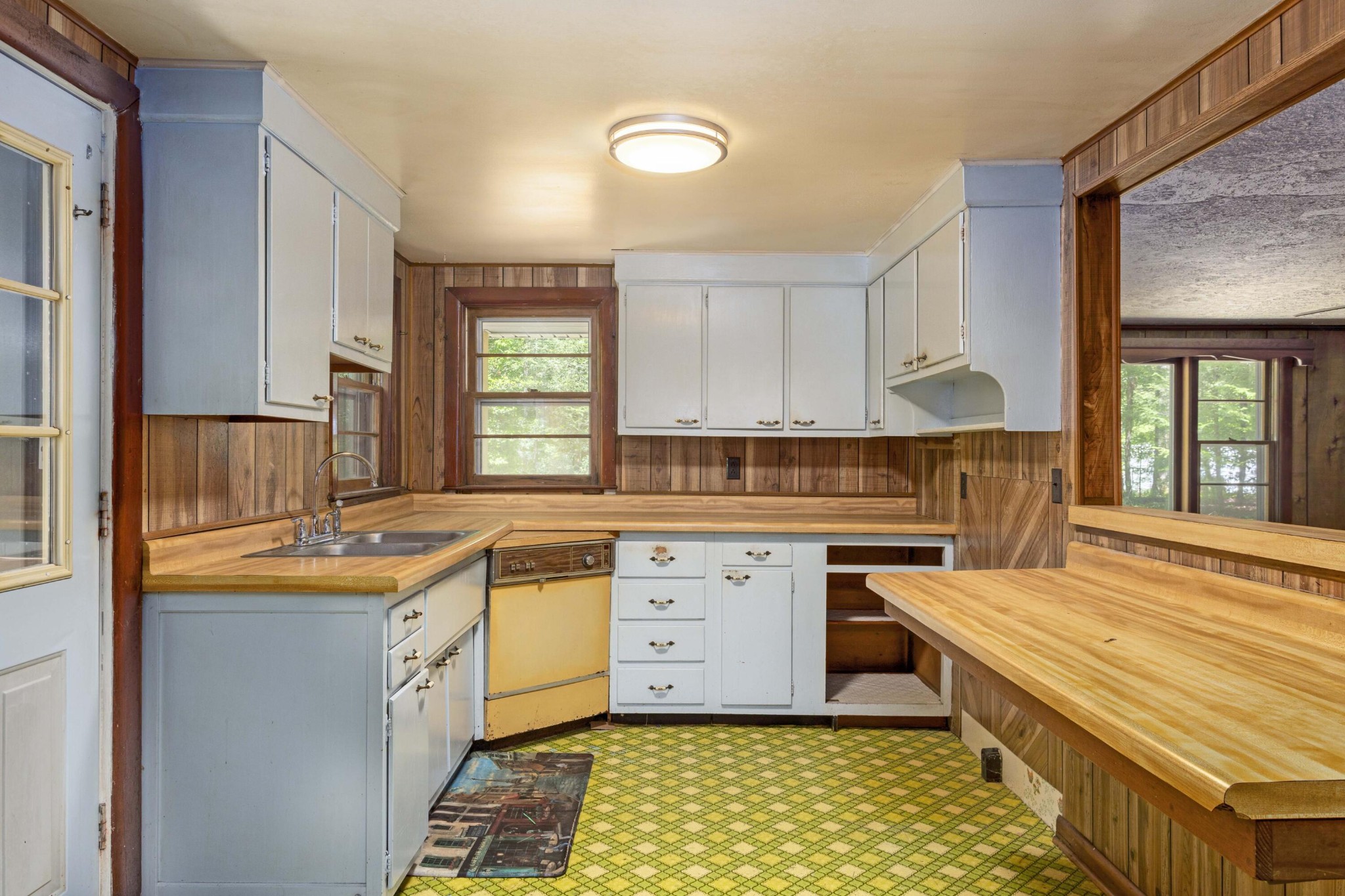 840 Eagle Furnace Road Rockwood, TN 37854 - Photo 8 of 32 a kitchen with a sink stove and cabinets