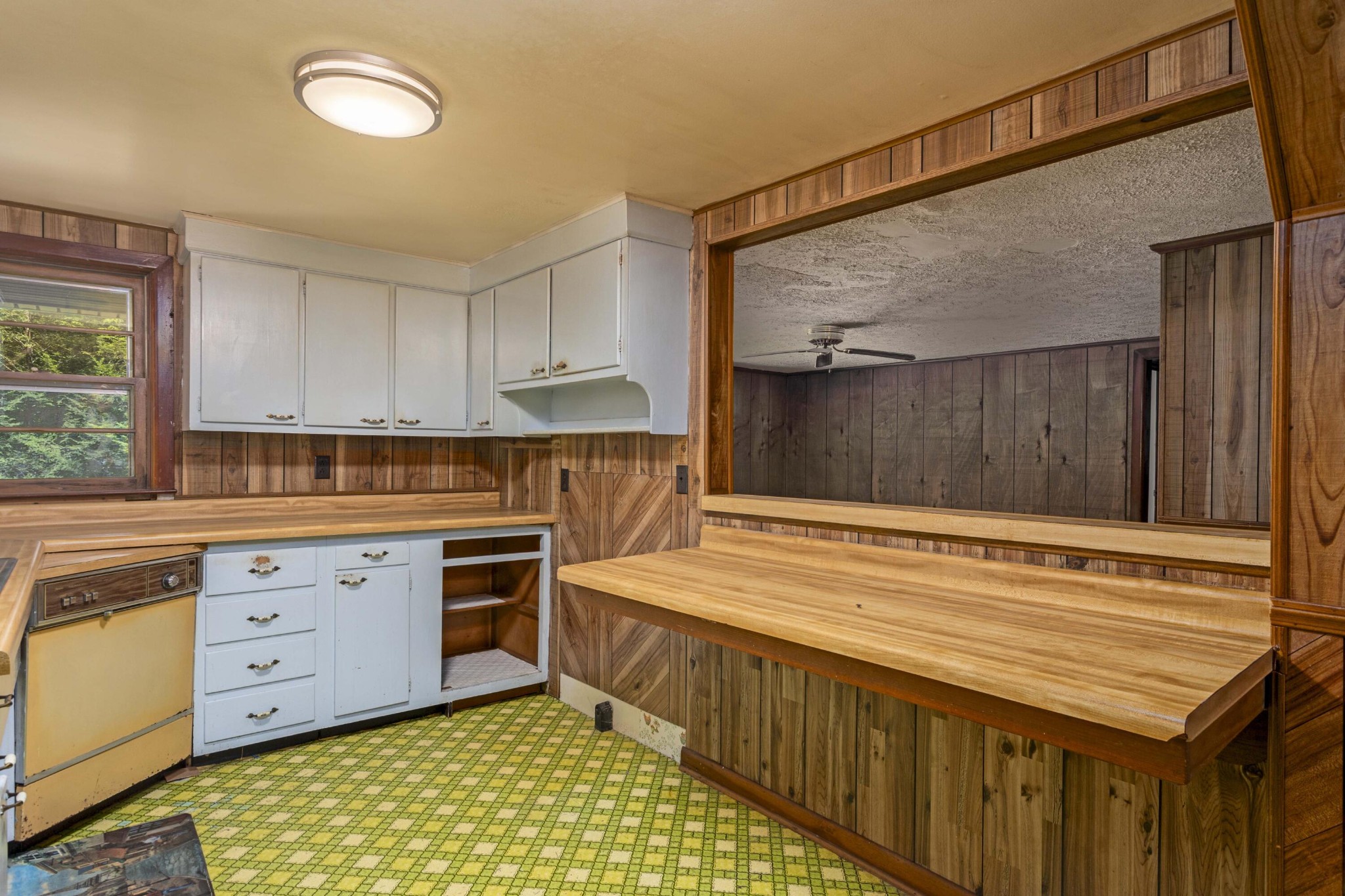 840 Eagle Furnace Road Rockwood, TN 37854 - Photo 9 of 32 a kitchen with sink cabinets and window
