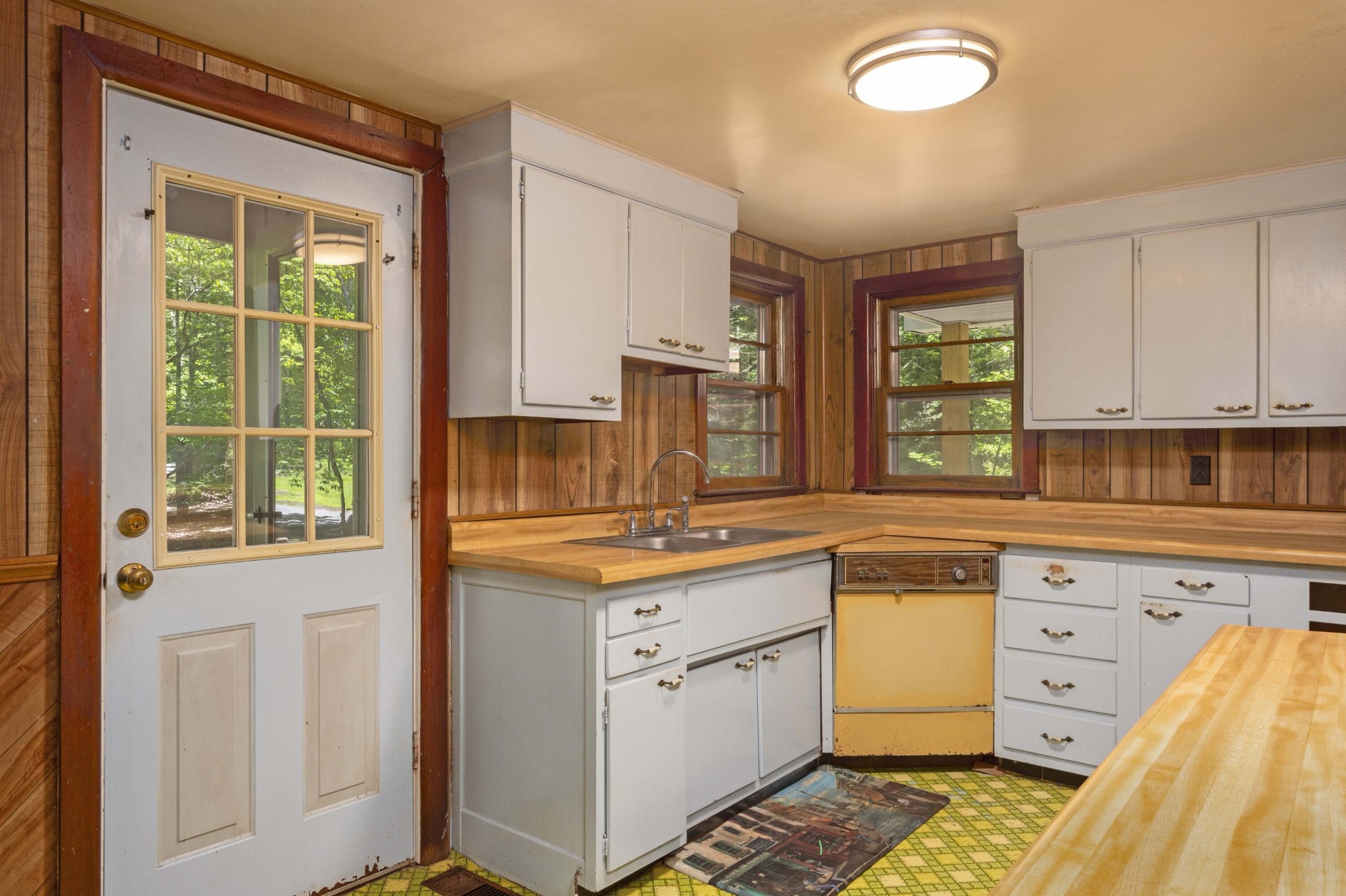 840 Eagle Furnace Road Rockwood, TN 37854 - Photo 10 of 32 a kitchen with a sink stove and cabinets