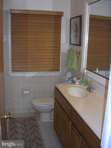 1303 Ruppert Road Silver Spring, MD 20903 - Photo 6 of 11 a bathroom with a sink and a toilet