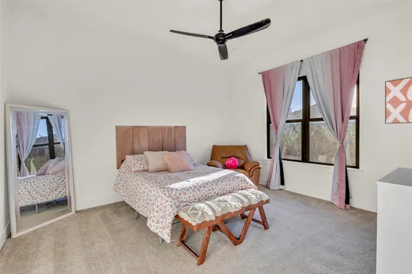 a bedroom with a bed and a walk in closet