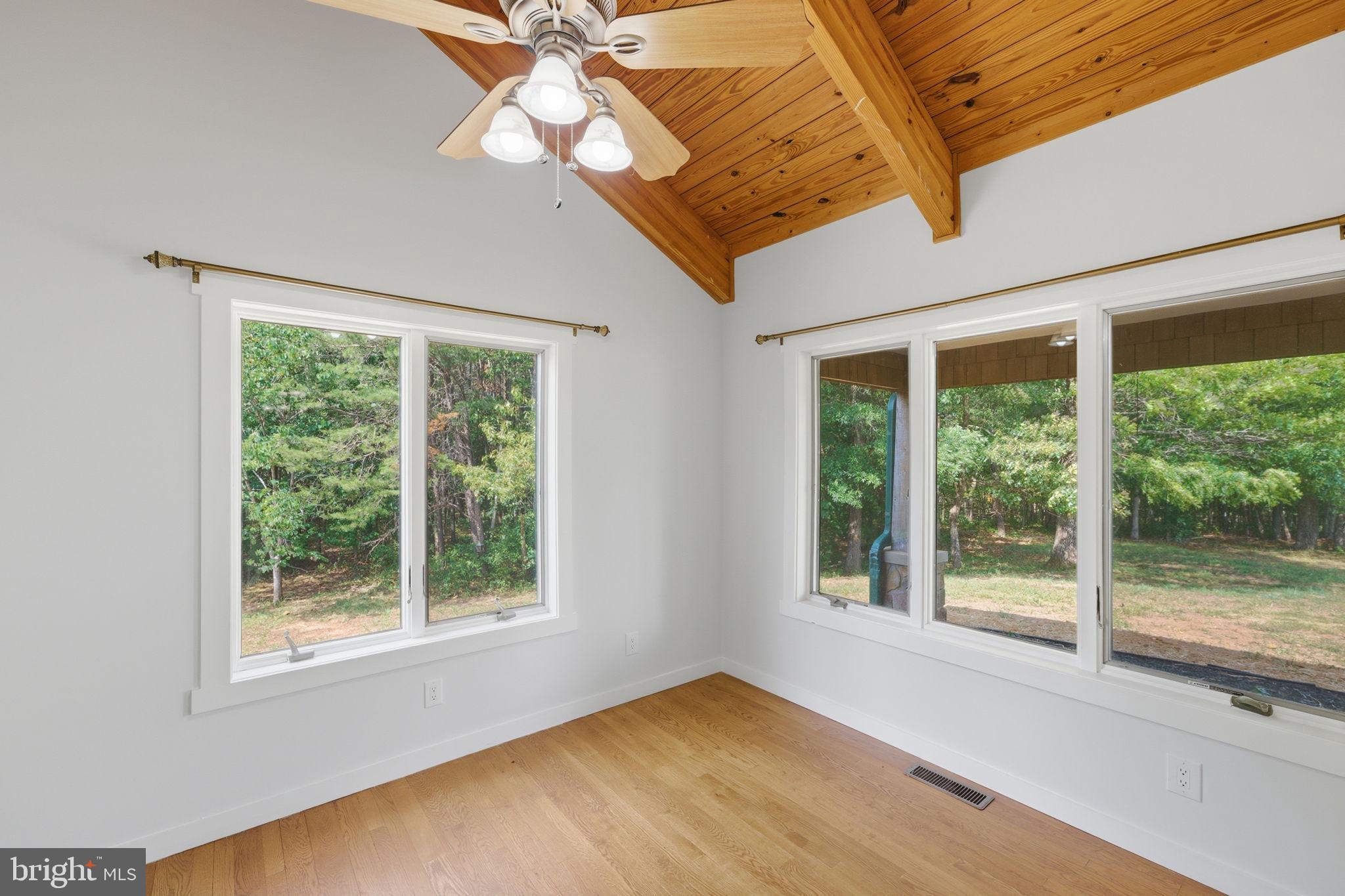 7522 Stubbs Bridge Road Spotsylvania, VA 22551 - Photo 12 of 60 a view of an empty room with a window