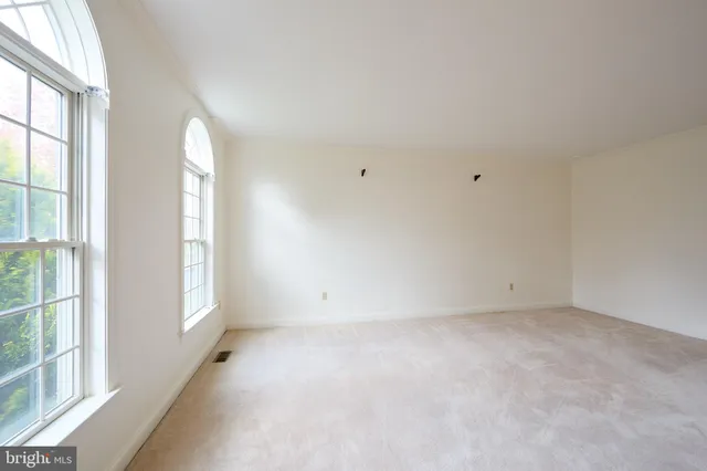 a kitchen with kitchen island granite countertop counter top space cabinets and stainless steel appliances