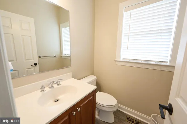 a view of a lake with a yard and entertaining space