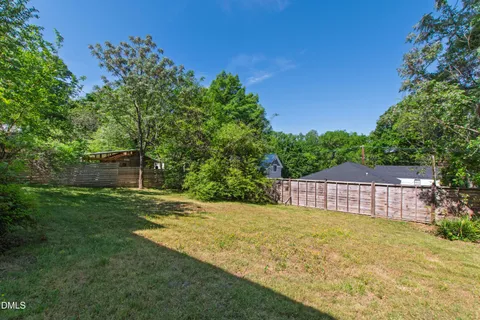 a view of a backyard with a garden