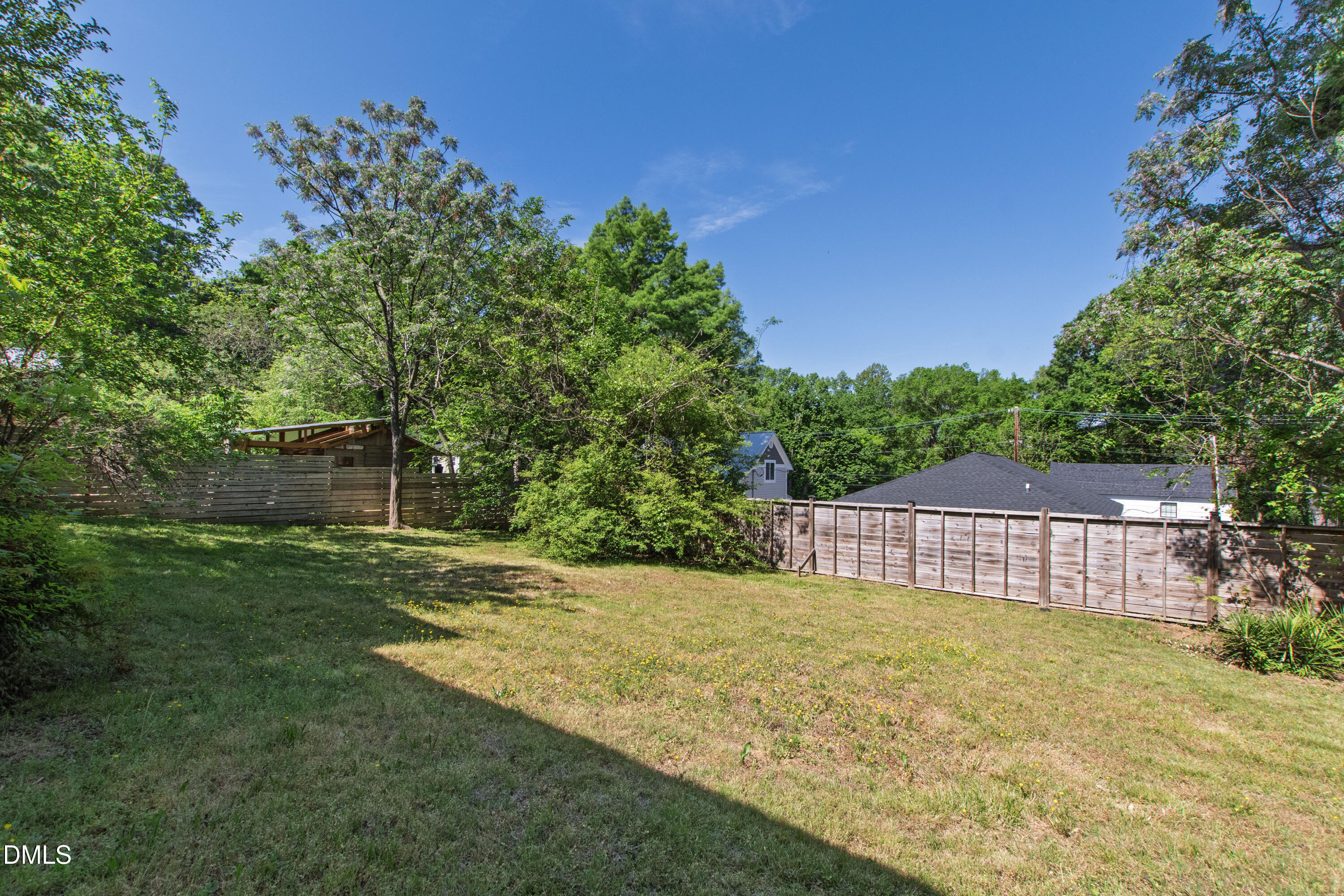 913 Washington Street Durham, NC 27701 - Photo 30 of 37 a view of a backyard with a garden