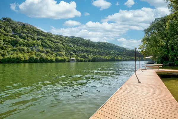 a view of a lake with a yard