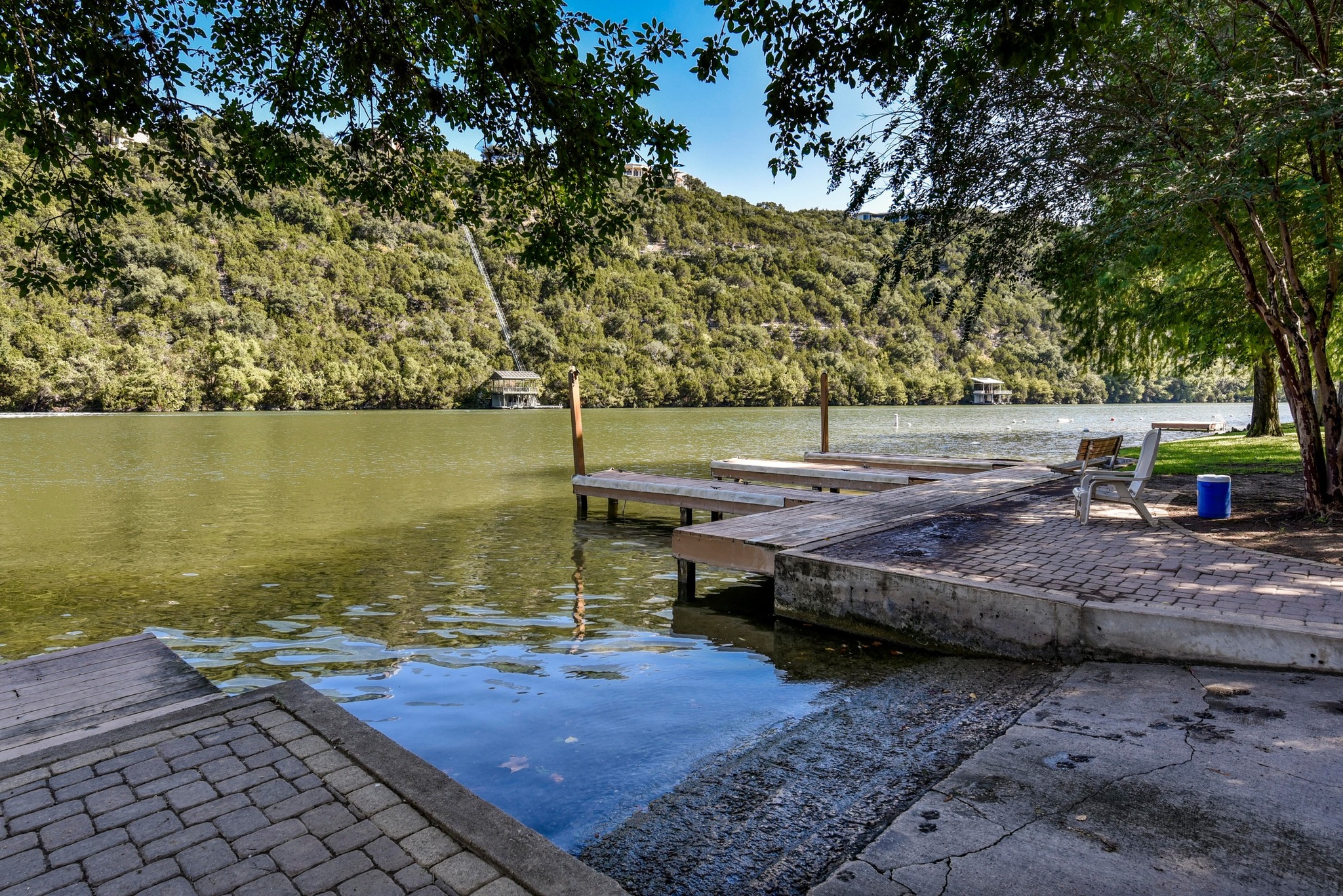 1707 Lipan Trail Austin, TX 78733 - Photo 23 of 24 a view of a lake with an outdoor space