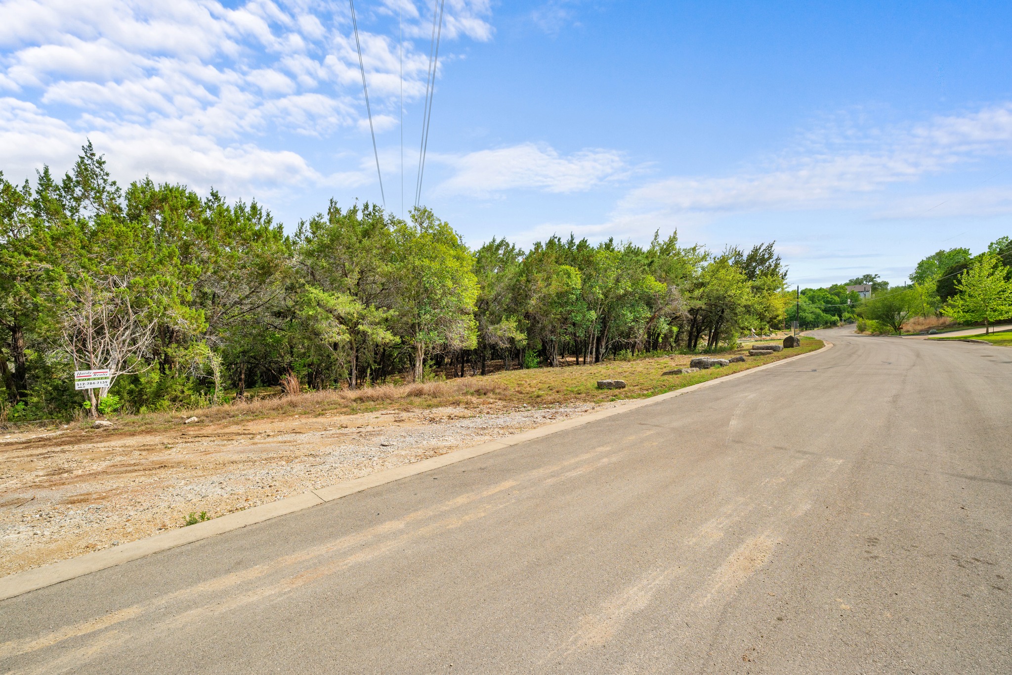 1707 Lipan Trail Austin, TX 78733 - Photo 4 of 24 a view of a swimming pool with a yard