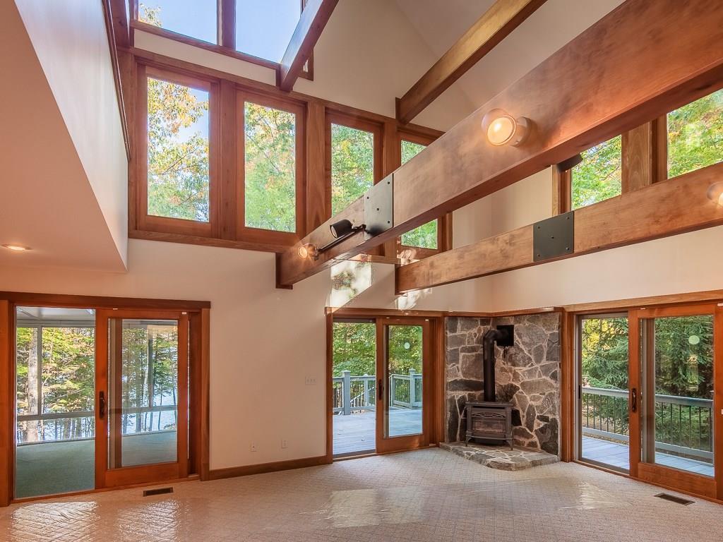 73 Loop Road Otisfield, ME 04270 - Photo 13 of 35 great room provides access to...