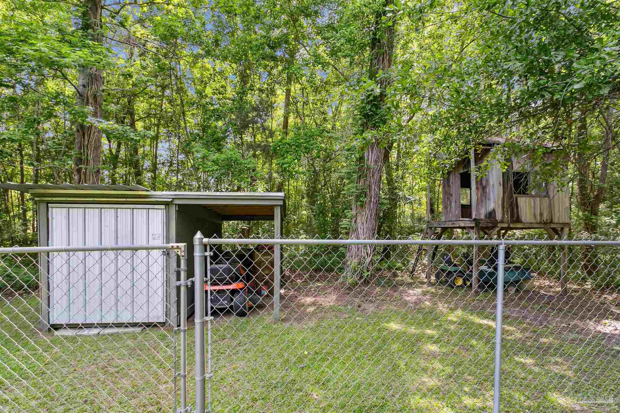 7260 Morrell Road Milton, FL 32583 - Photo 29 of 33 a view of a backyard