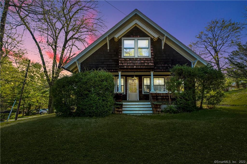 103 Middlebury Road Watertown, CT 06795 - Photo 1 of 1 a front view of a house with a yard
