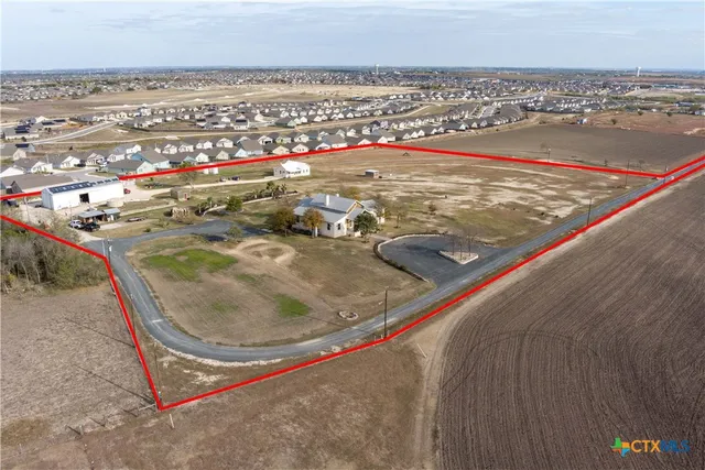 a front view of a house with a outdoor space