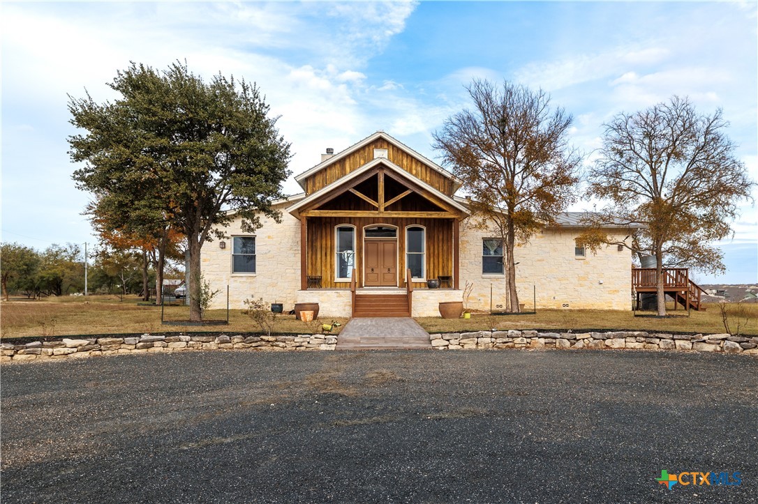 1440 West Klein Road New Braunfels, TX 78130 - Photo 2 of 42 a front view of a house with a outdoor space