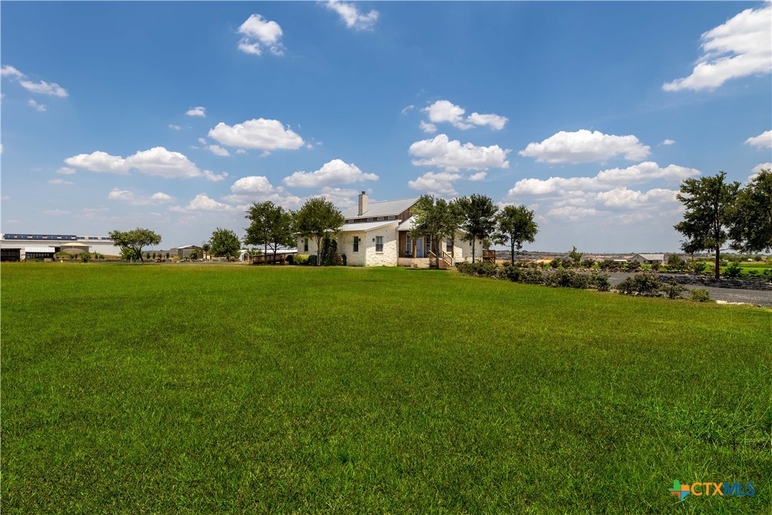 1440 West Klein Road New Braunfels, TX 78130 - Photo 39 of 42 a view of a green field with sitting in middle of the park