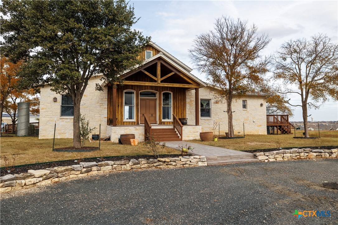 1440 West Klein Road New Braunfels, TX 78130 - Photo 4 of 42 a front view of a house with a road