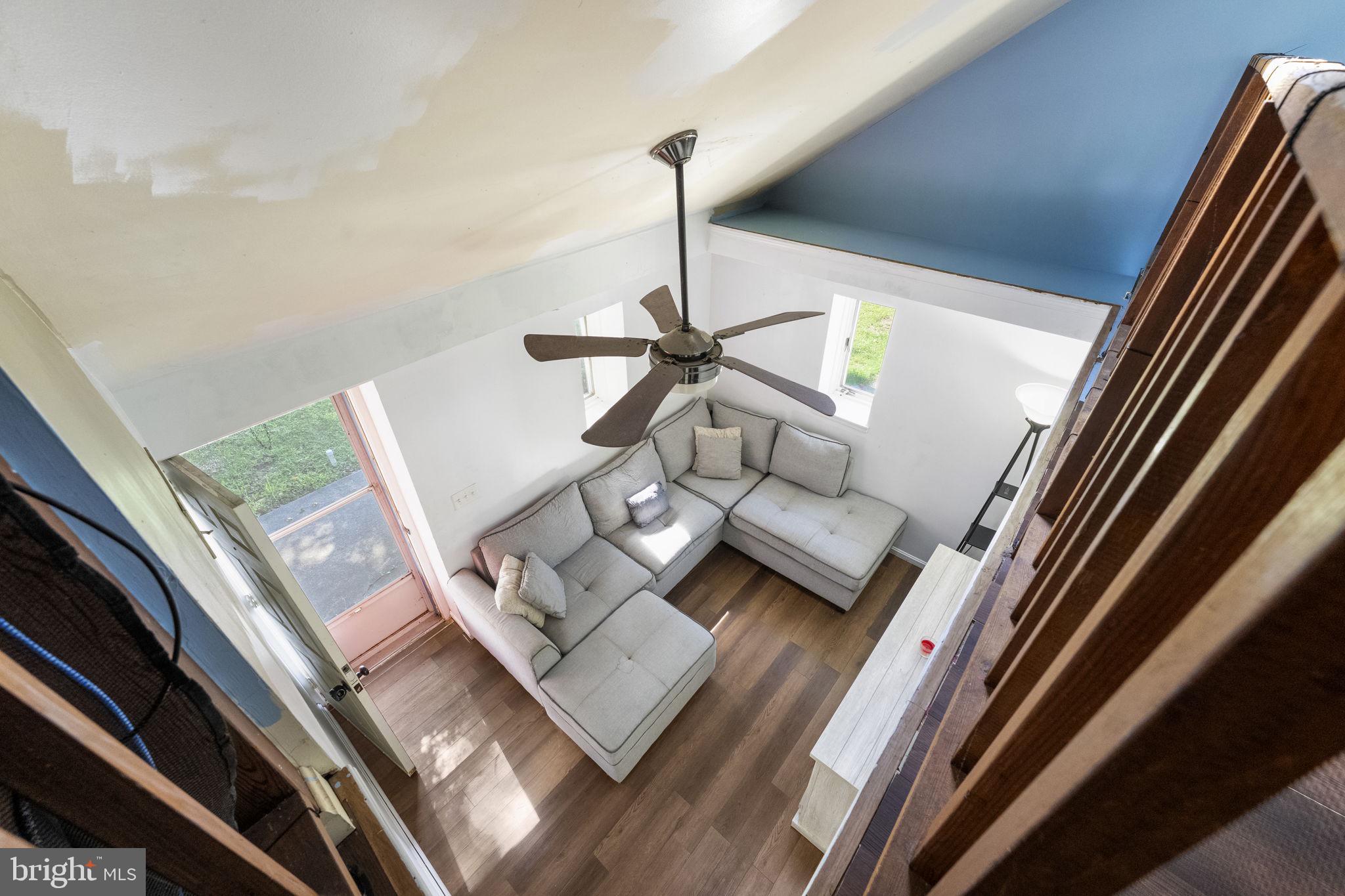 5087 Wheatleys Pond Road Smyrna, DE 19977 - Photo 19 of 36 a living room with a couch