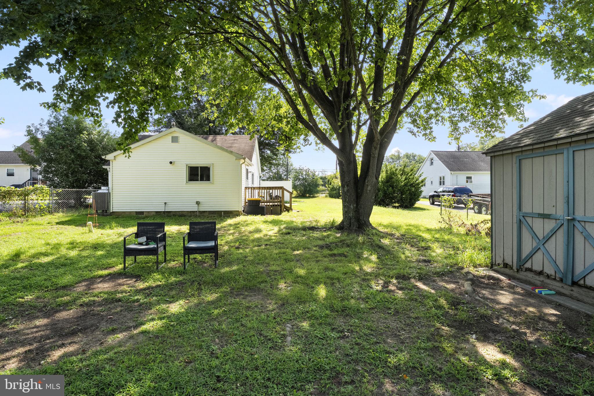 5087 Wheatleys Pond Road Smyrna, DE 19977 - Photo 32 of 36 a view of a house with a yard