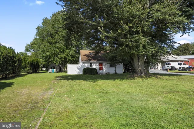 a house view with a garden space