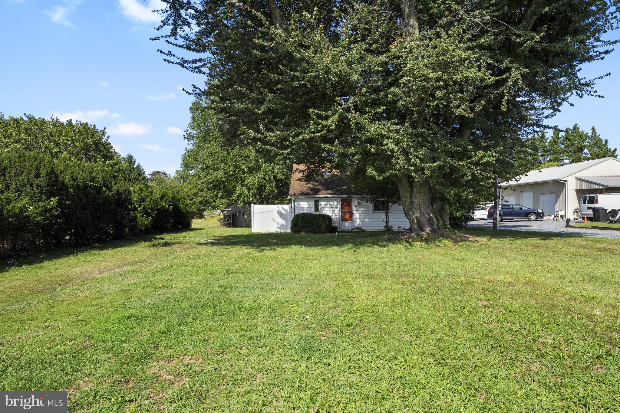 5087 Wheatleys Pond Road Smyrna, DE 19977 - Photo 36 of 36 a house view with a garden space