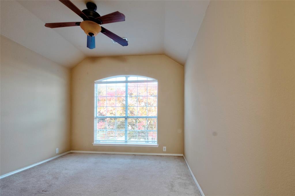 2012 Trinity Lane McKinney, TX 75072 - Photo 20 of 32 an empty room with a window and a fan