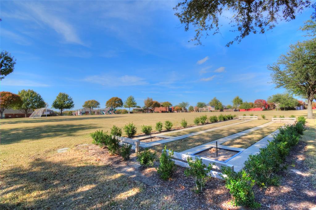 2012 Trinity Lane McKinney, TX 75072 - Photo 29 of 32 a view of a lake with outdoor space