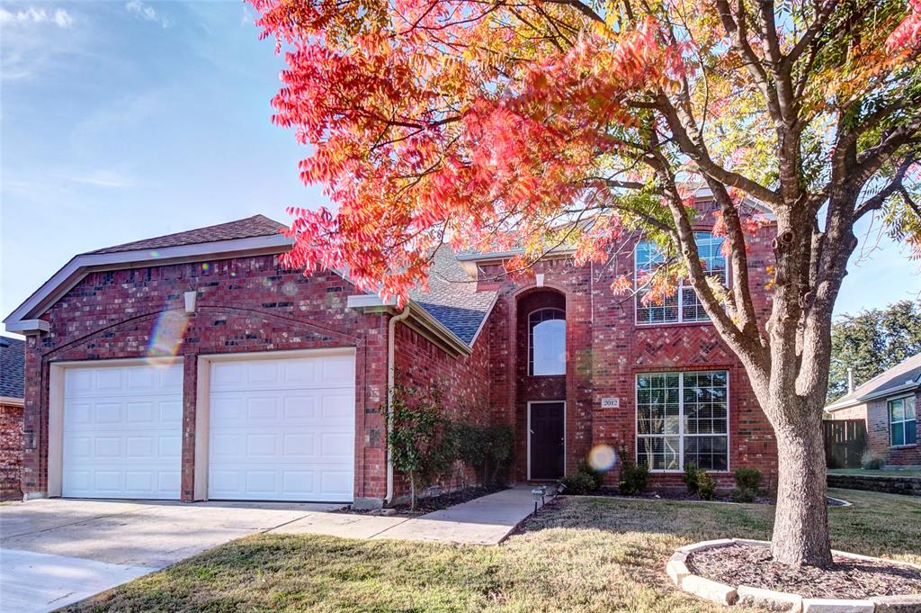 2012 Trinity Lane McKinney, TX 75072 - Photo 31 of 32 a front view of a house with a yard