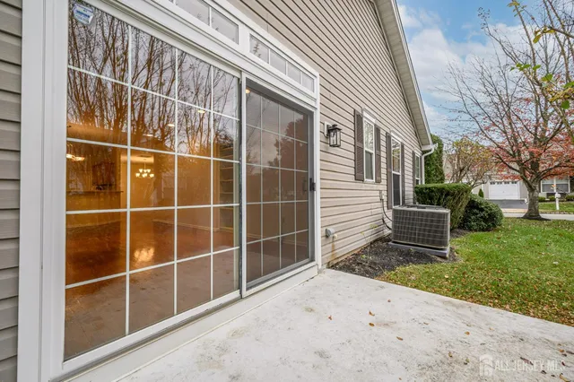 a view of a backyard with a fence