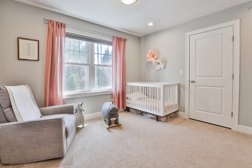 2 Trail Ridge Way, Unit D Harvard, MA 01451 - Photo 24 of 31 a living room with furniture and a window