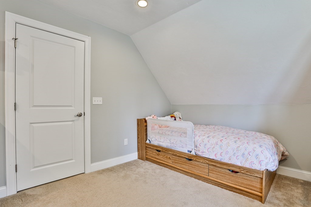 2 Trail Ridge Way, Unit D Harvard, MA 01451 - Photo 25 of 31 a bedroom with a bed and a cabinets
