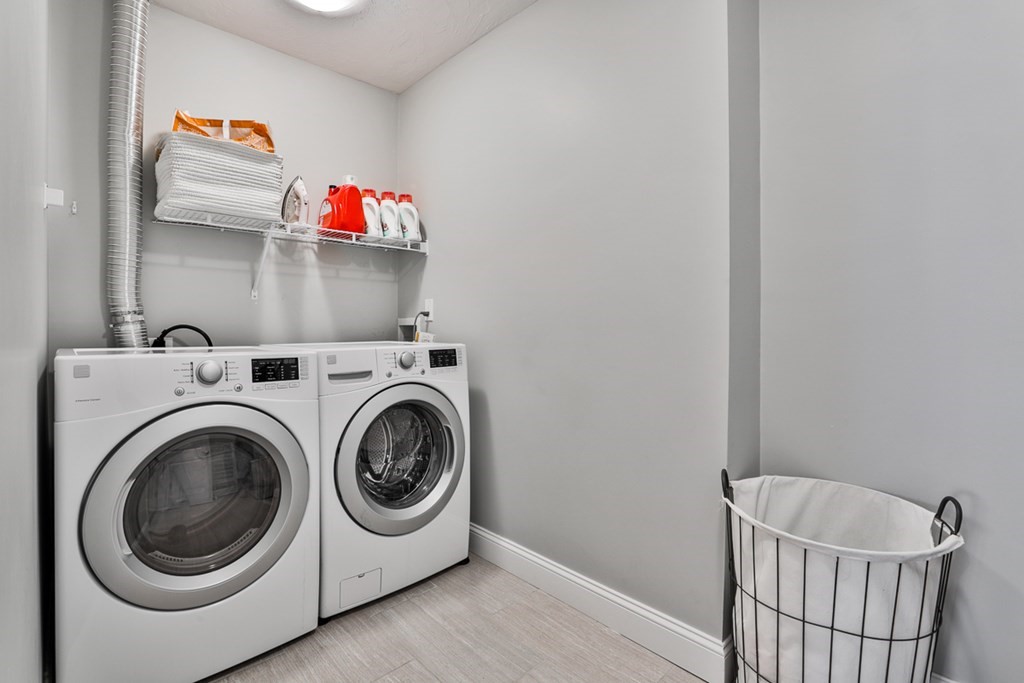 2 Trail Ridge Way, Unit D Harvard, MA 01451 - Photo 26 of 31 a storage room with washer and dryer