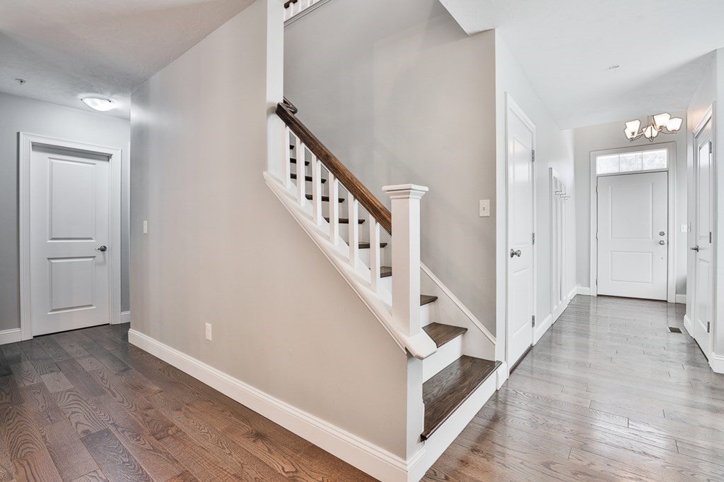 2 Trail Ridge Way, Unit D Harvard, MA 01451 - Photo 3 of 31 a view of entryway with wooden floor
