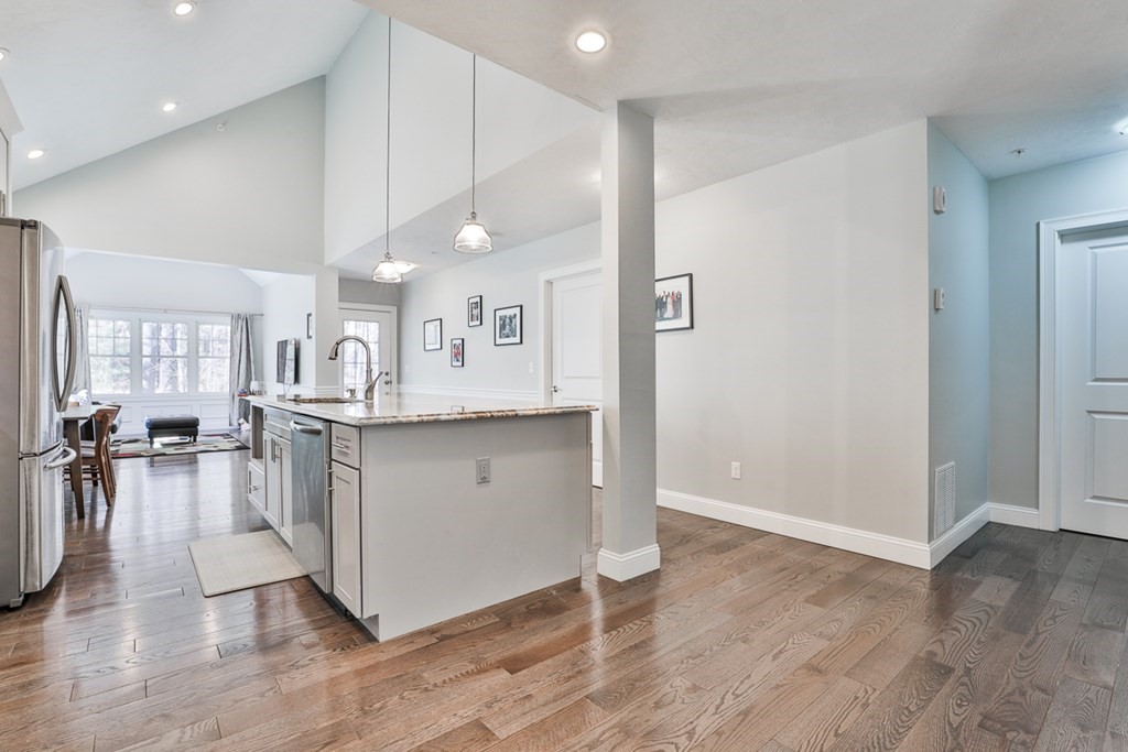 2 Trail Ridge Way, Unit D Harvard, MA 01451 - Photo 10 of 31 a large white kitchen with lots of counter space and appliances