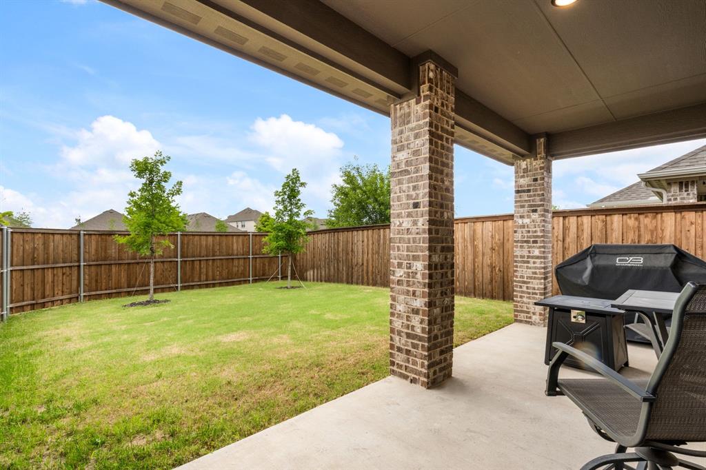 321 Pasture Drive Midlothian, TX 76065 - Photo 35 of 40 a view of a backyard with furniture
