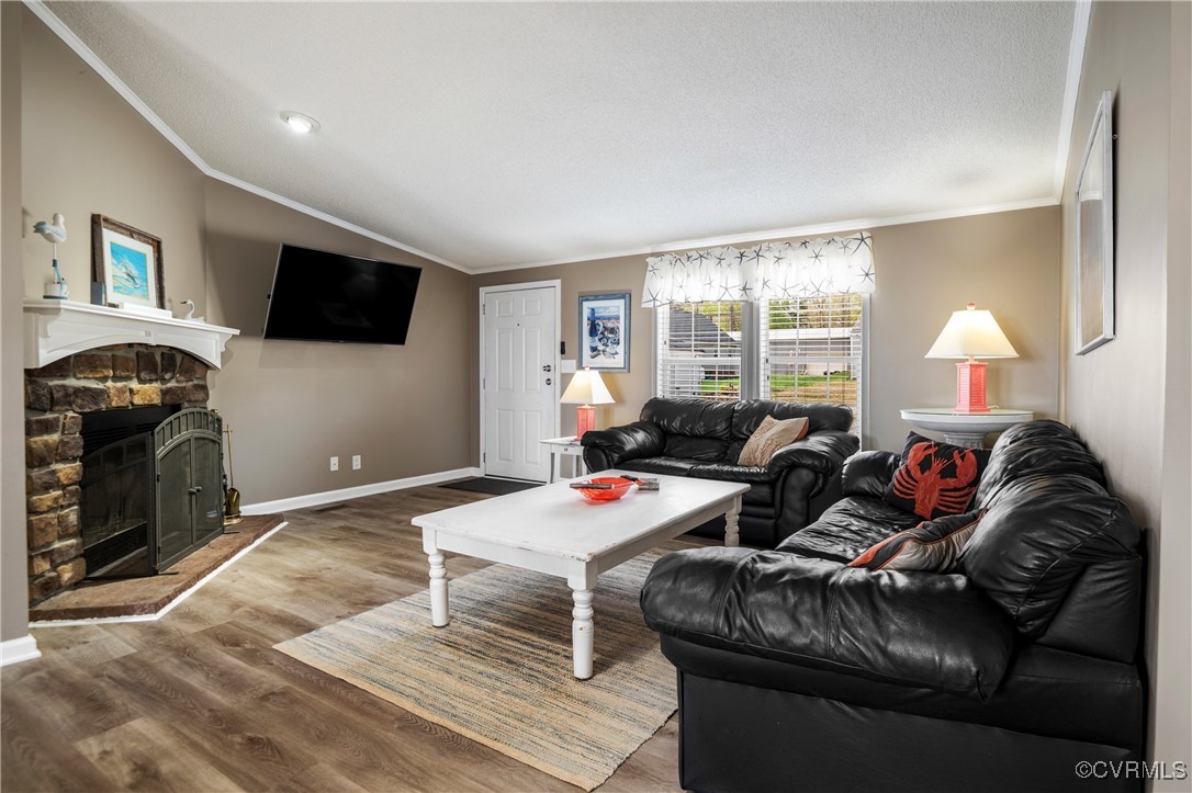 374 James River Overview Spring Grove, VA 23881 - Photo 13 of 49 a living room with furniture a flat screen tv and a large window