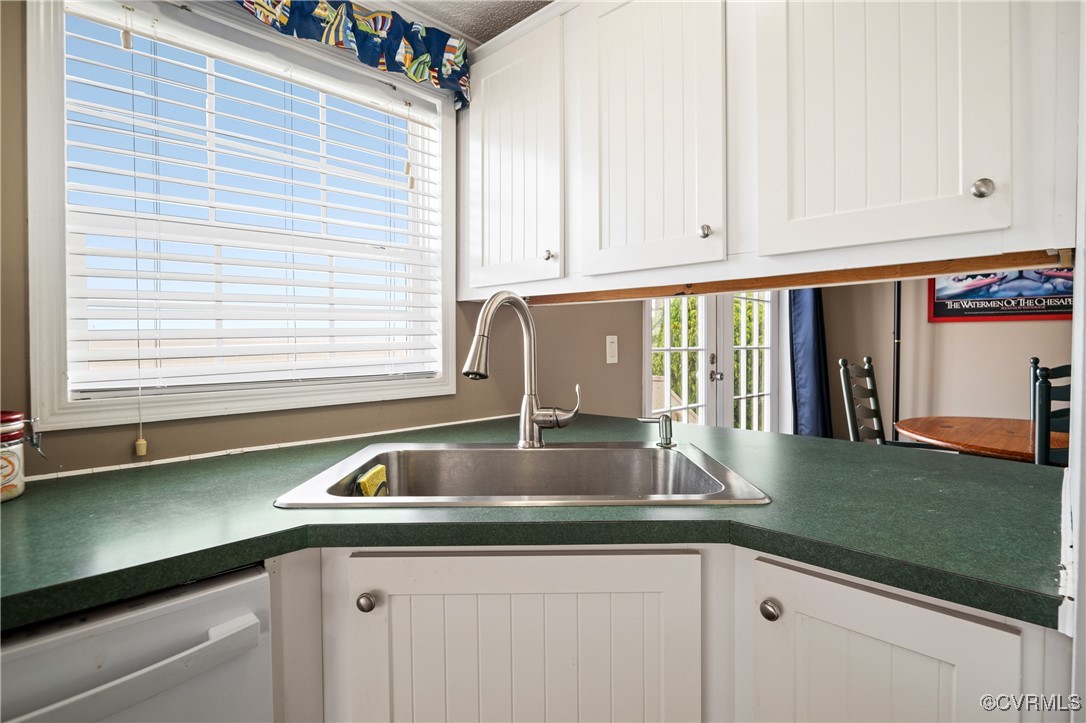 374 James River Overview Spring Grove, VA 23881 - Photo 24 of 49 a kitchen with granite countertop a sink and a window