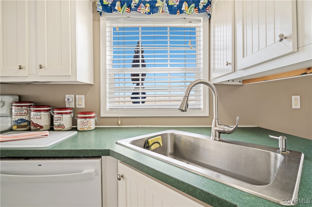 374 James River Overview Spring Grove, VA 23881 - Photo 25 of 49 a kitchen with granite countertop a sink and a stove top oven