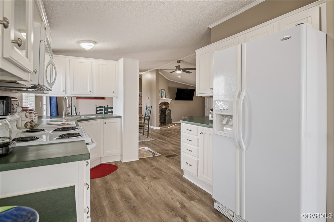 374 James River Overview Spring Grove, VA 23881 - Photo 26 of 49 a kitchen with stainless steel appliances white cabinets and a refrigerator