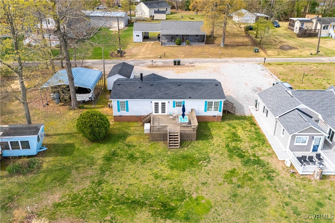 374 James River Overview Spring Grove, VA 23881 - Photo 48 of 49 a swimming pool with outdoor seating and yard