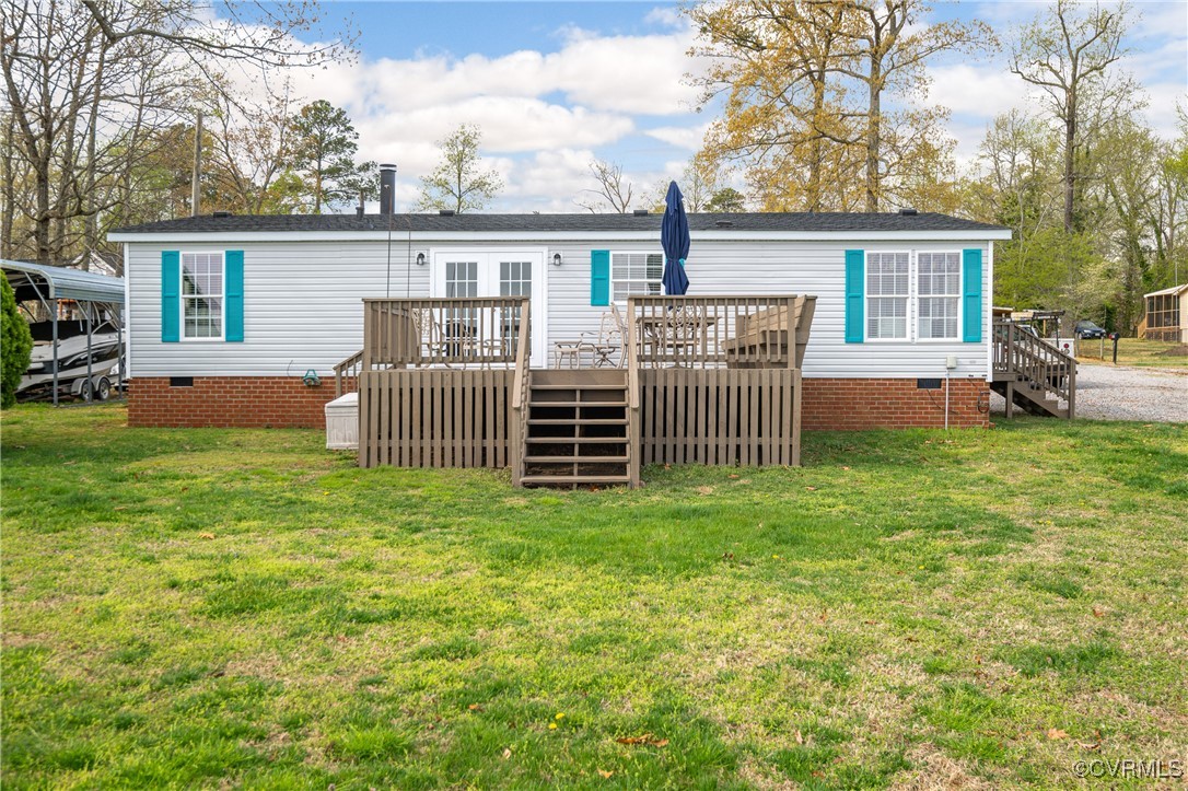 374 James River Overview Spring Grove, VA 23881 - Photo 8 of 49 a front view of a house with garden