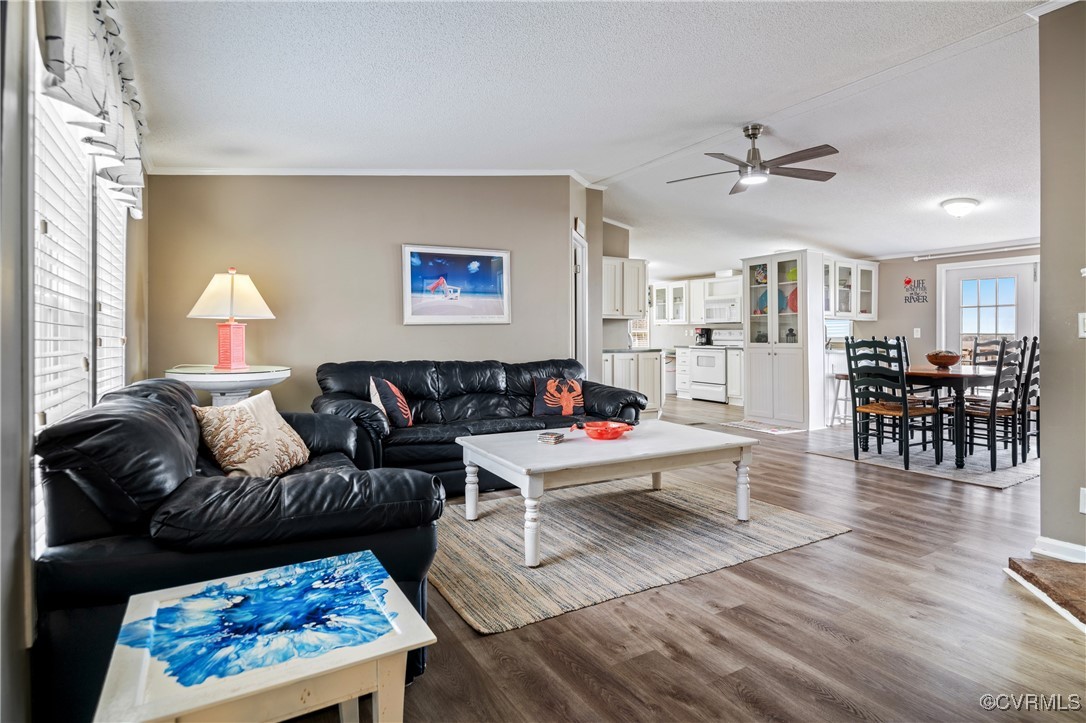 374 James River Overview Spring Grove, VA 23881 - Photo 10 of 49 a living room with furniture a wooden floor and chandelier