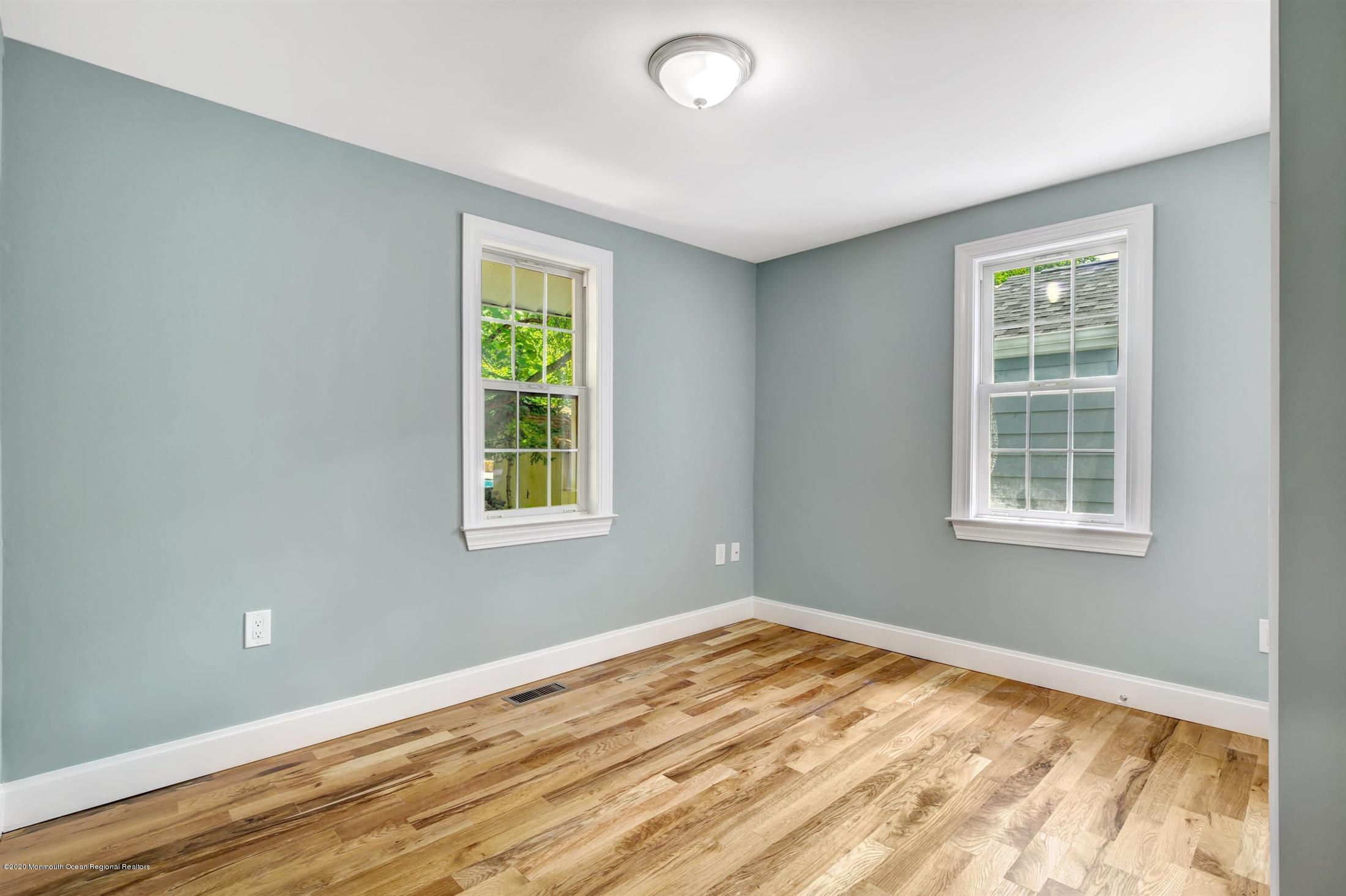 1698 Forge Pond Road Brick, NJ 08724 - Photo 22 of 32 a view of an empty room with a window