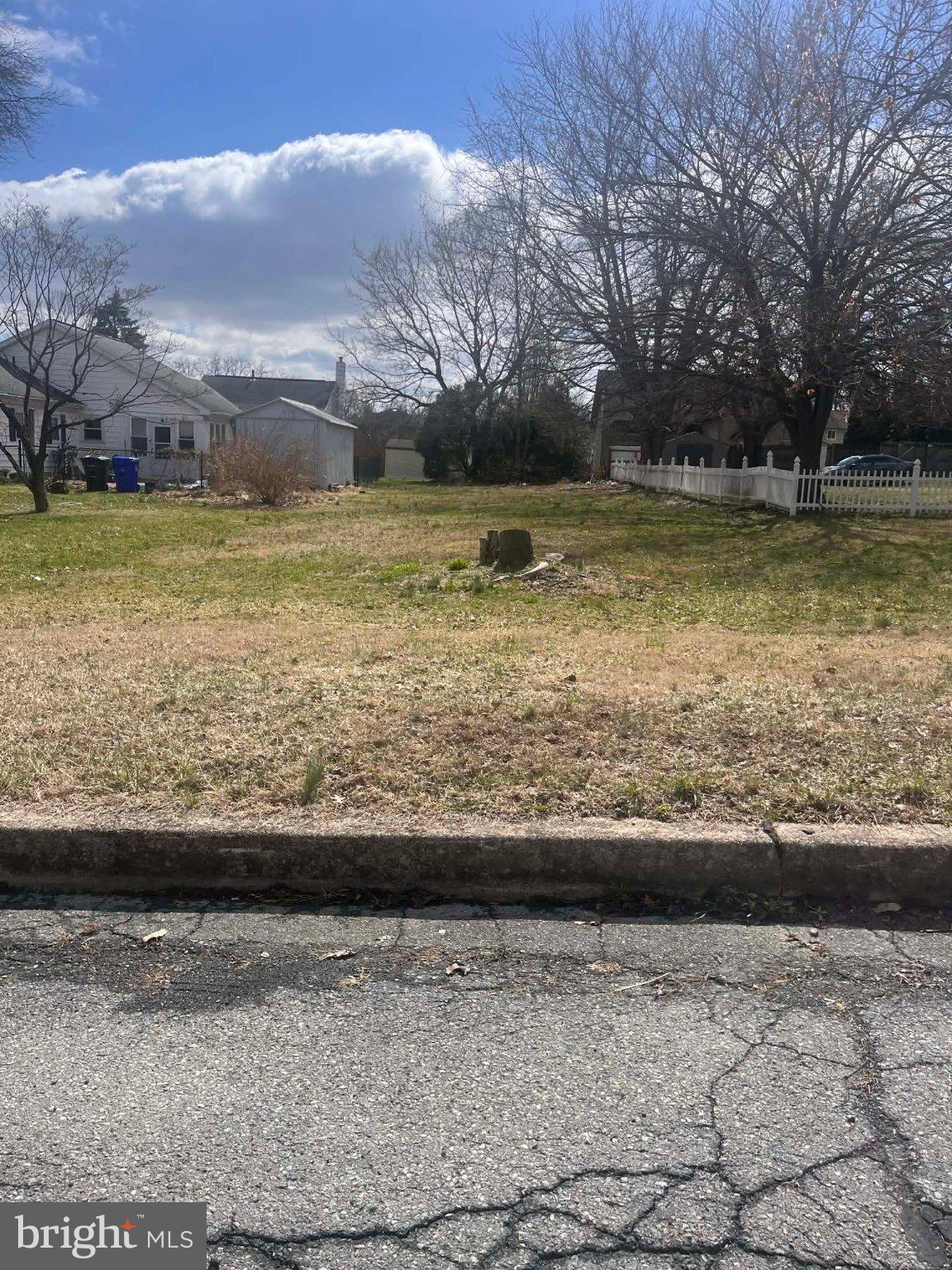 1428 Liggett Avenue Reading, PA 19607 - Photo 3 of 10 a view of a large pool with lawn chairs and large trees