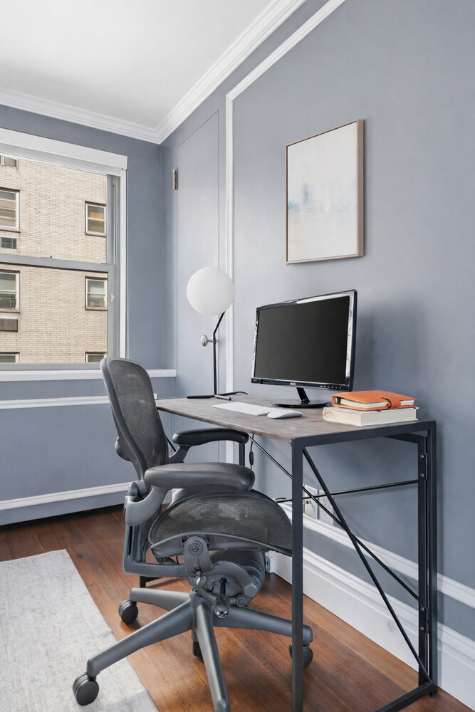 110 East 36th Street, Unit 12B Manhattan, NY 10016 - Photo 9 of 16 a view of a workspace with a window