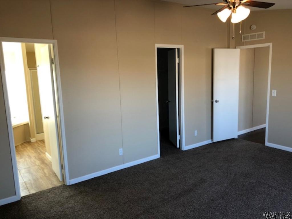 3158 West Malibu Road, Unit 3 Golden Valley, AZ 86413 - Photo 18 of 30 Other side of master bedroom