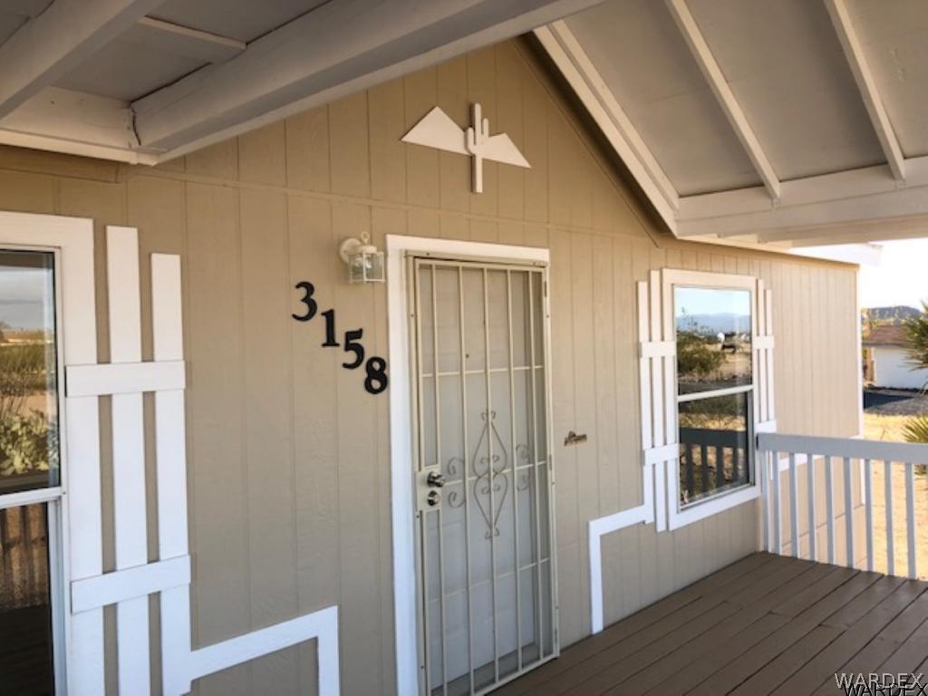 3158 West Malibu Road, Unit 3 Golden Valley, AZ 86413 - Photo 24 of 30 Inviting front porch