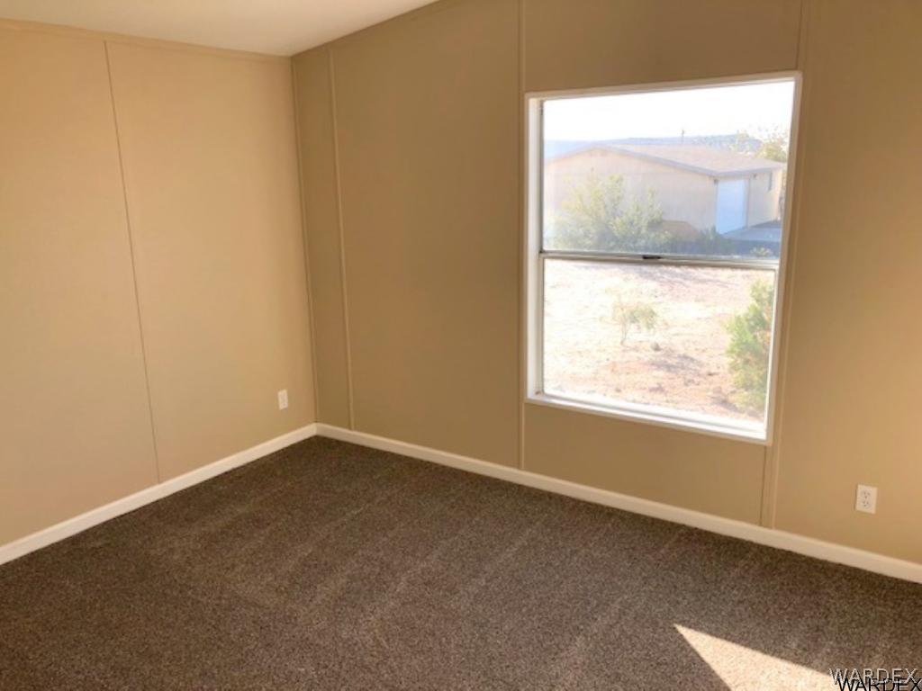 3158 West Malibu Road, Unit 3 Golden Valley, AZ 86413 - Photo 10 of 30 Guest bedroom 1