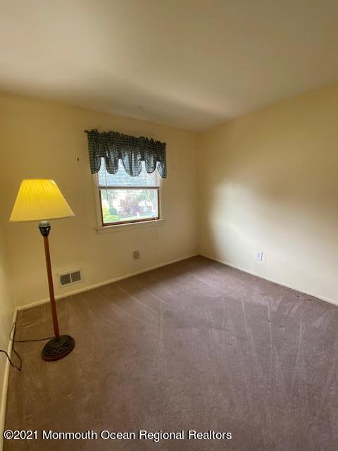 15 Andover Road Jackson, NJ 08527 - Photo 8 of 14 a view of an empty room with a window