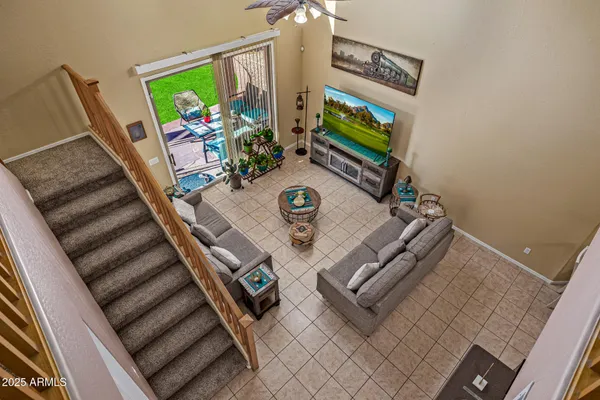 a view of living room with furniture and a flat screen tv