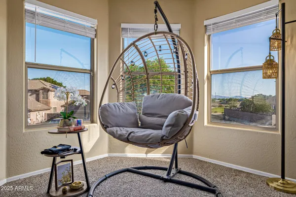 a living room with furniture and a window